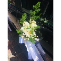 Wedding car decor with greens