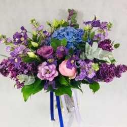 Bridal bouquet with purple...