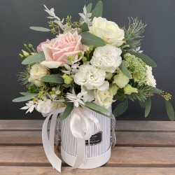 White flowers in a white box