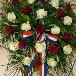 Funeral wreath with white...